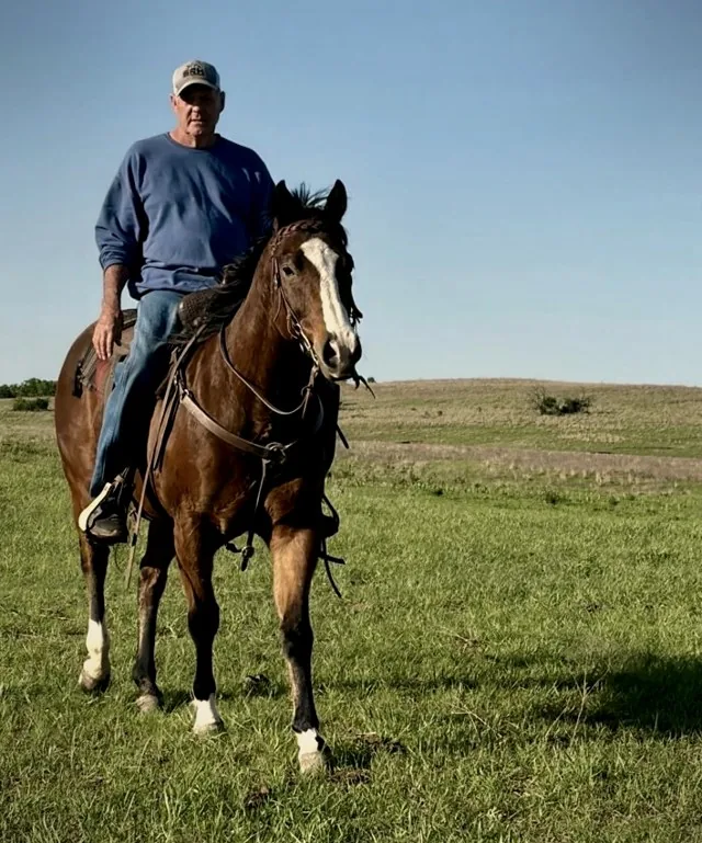 Lenn Noble riding at the ranch